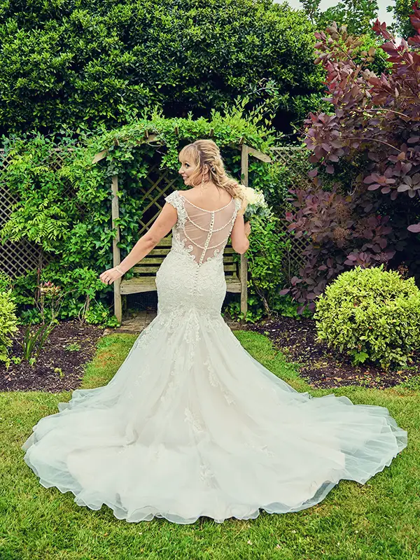 Bride posing in her dress at the Council House Malvern